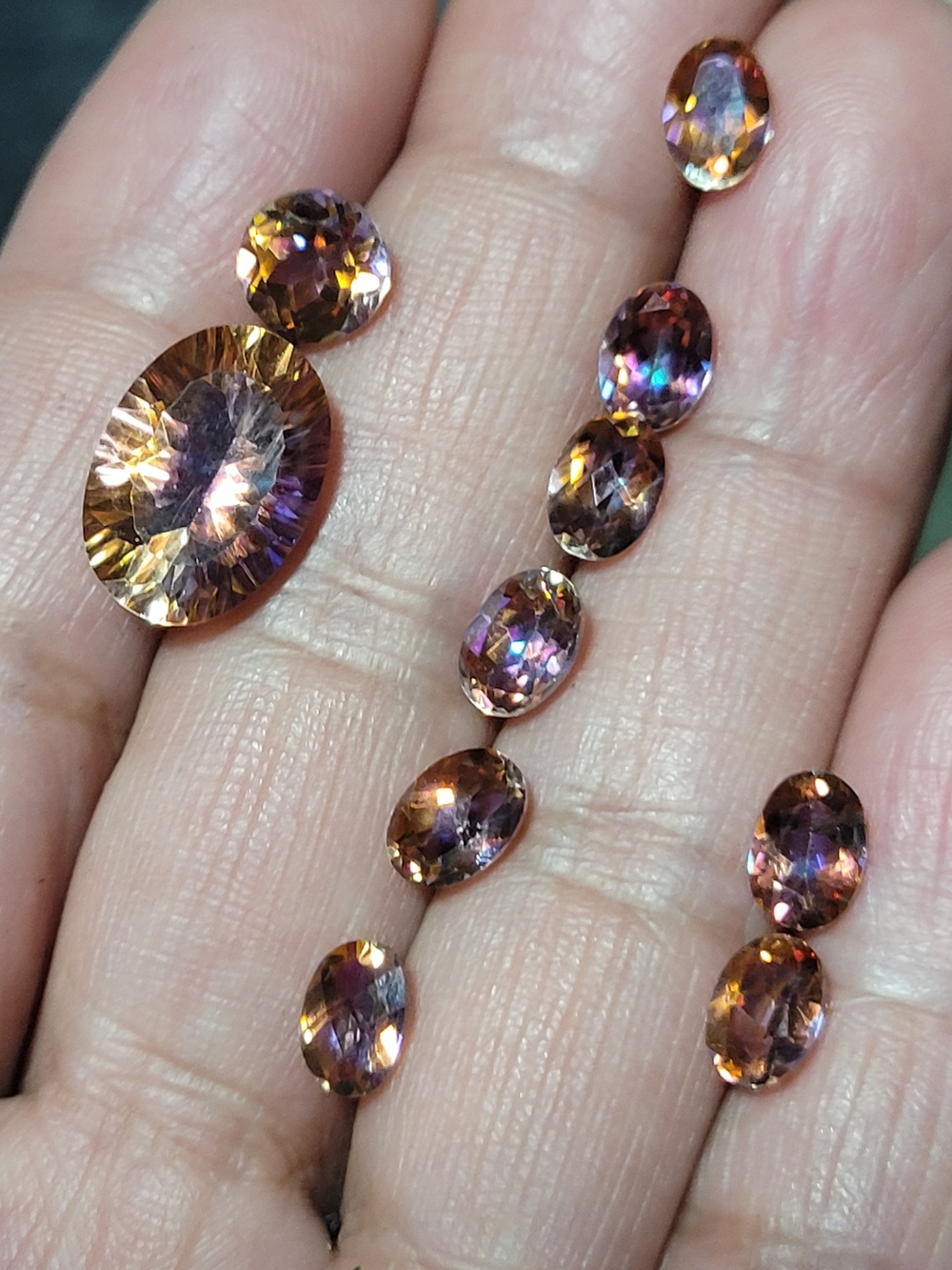 Iridescent Brown Oval Faceted Gemstone Ring - Elegant Sparkle